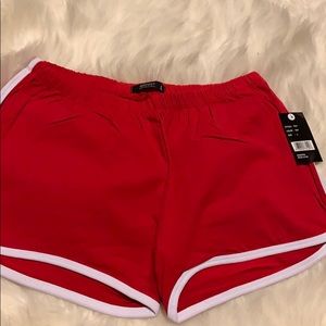 Red running shorts .
